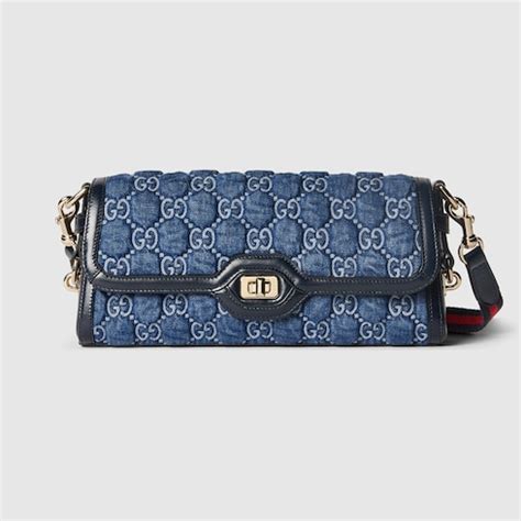 blue demin gucci bag|Gucci Luce small shoulder bag in blue GG denim .